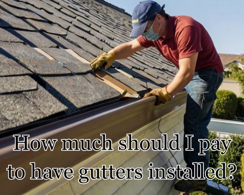 a roofer installing gutter carefully